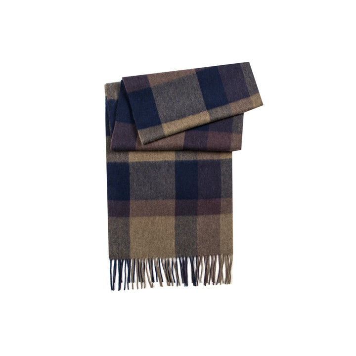 Elevate your winter style with the Serene Plaid Shawl. Crafted from 100% yak wool, this soft and warm accessory in Earth, Dusk, and Iris adds elegance to any look.

